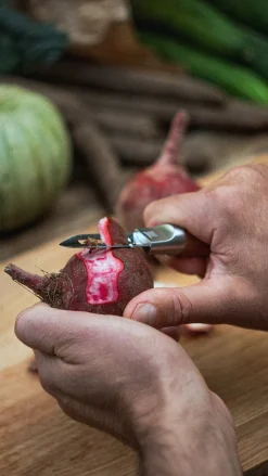 Pelador de patatas Norden, acero inoxidable-abedul