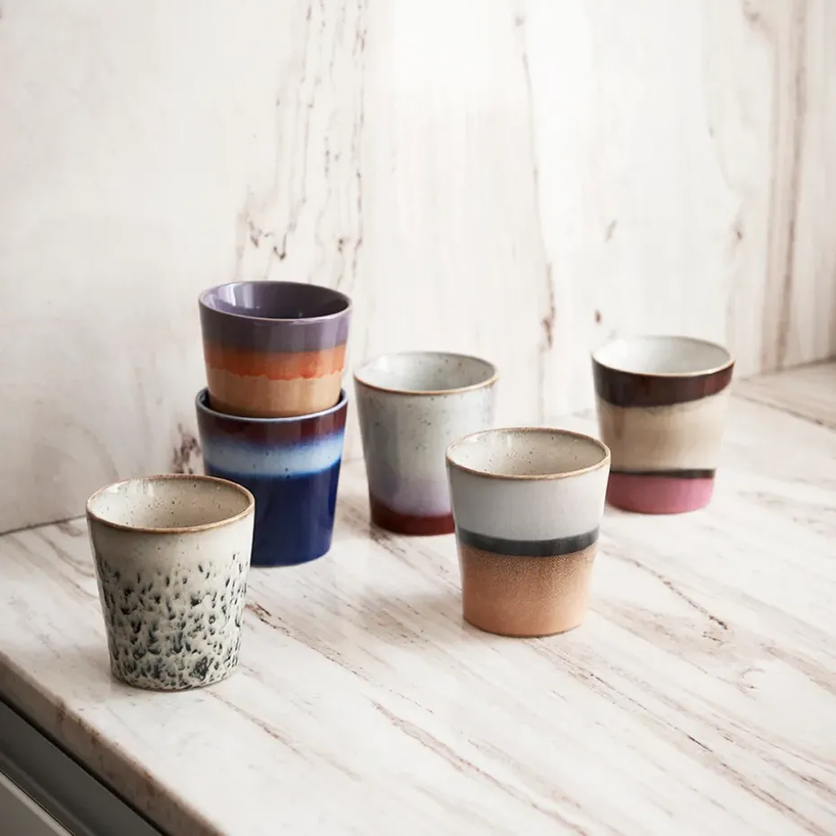 Taza 70's, Hail